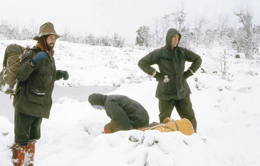 tas-walls_snow With the woman doubled in pain, the party stop to discuss what to do.