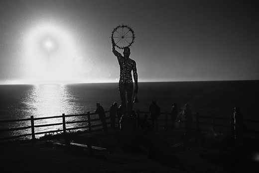 Seen from Cape Byron, the sun emerges from the Pacific. The sculpture was one of a number along the Cape Byron walking track during the annual sculpture festival.