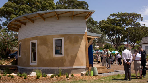 CPCG_opening_building2 The strawbale classroom features recycled windows and doors.