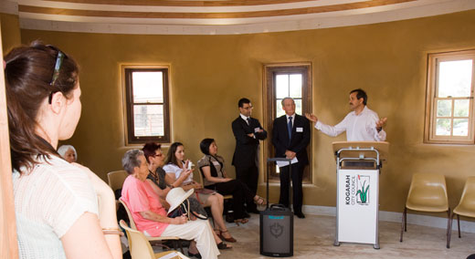 CPCG_opening_ceremony2 A community garden representative addresses visitors while th Mayor and General Manager look on.