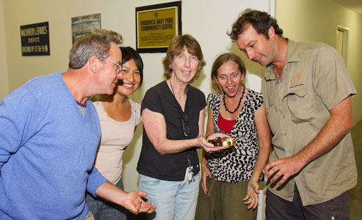 ls_chocolates After ceremonies ended and people departed, Fiona distributes locally made chocolates to trainers and organisers of the Living Smart and Sustainable Gardening courses. (from left)... Phillip Booth, who is evaluating the courses; photovoltain systems expert and trainer-in-training, Suzie Hunter; courses organiser and council Sustainability Education Officer, Fiona Campbell; Sustainable Gardening course trainer, horticulturist and community gardener, Emma Daniell; Sustainable Gardening course trainer, landscape architect, permaculture designer and horticulturist, Steve Batley.