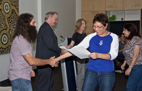 LS4 Randwick Mayor, Murray Matson (in suit) and Costa congratulate Living Smart and Sustainable Living course participants as they receive their certificates.