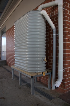 RCC9 A 5000 litre water tank equipped with a tap raised so as to et a watering can below provides water for Sustainable Gardening course practical activities.