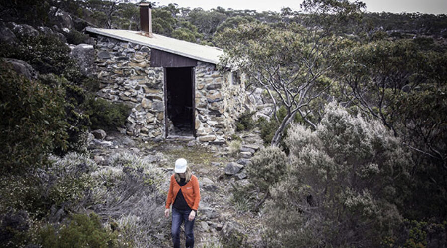 High on a mountain, a little stone hut