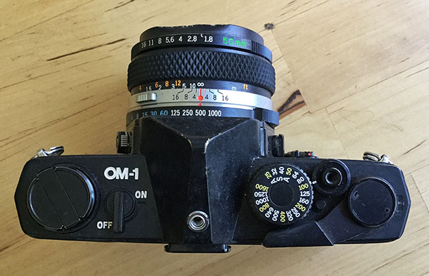 Light weight, low bulk — the Olympus OM1 became available around 1973 and countered the trend towards bulkier, heavier SLR cameras.